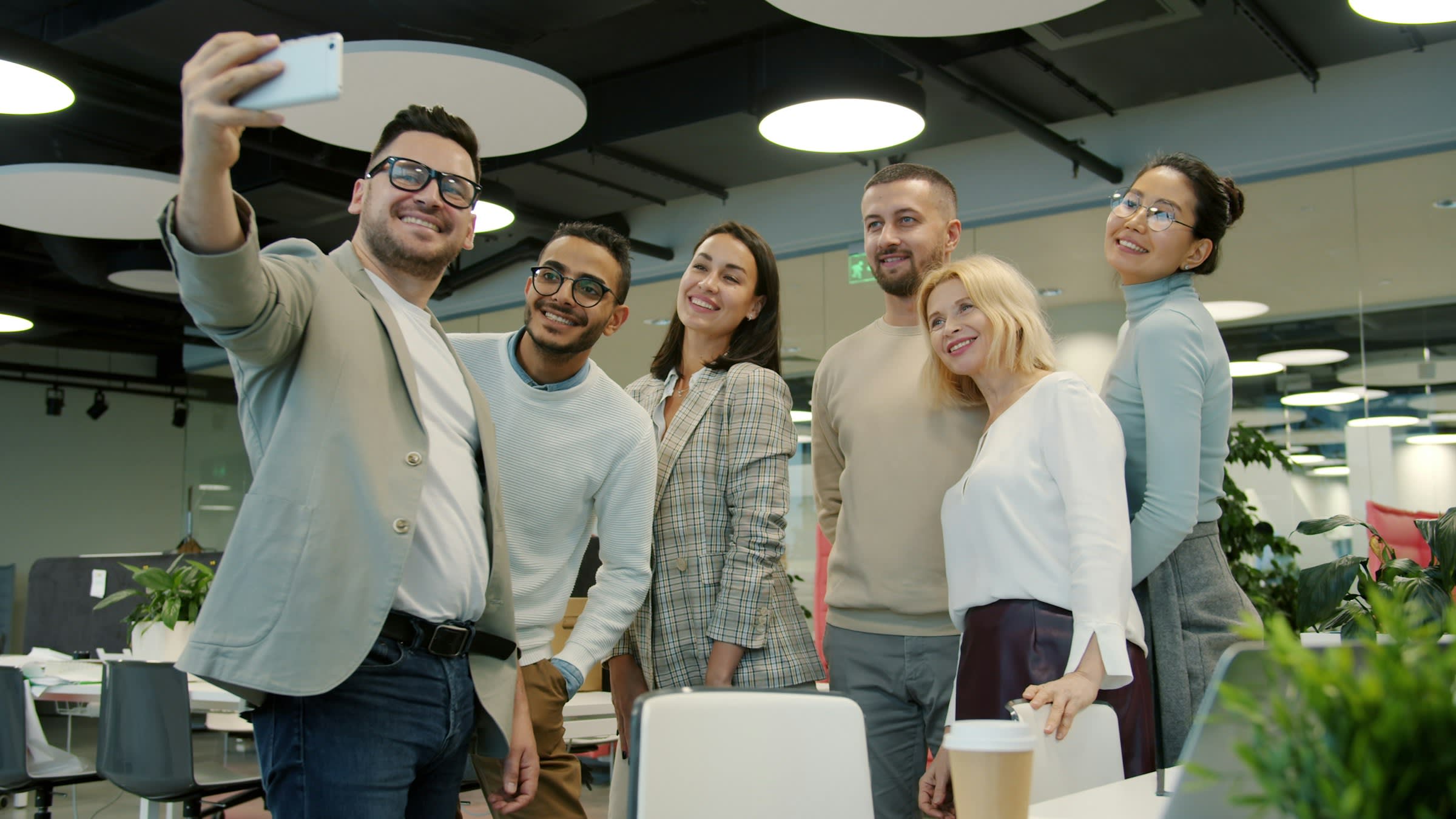 https://unsplash.com/photos/colleagues-taking-a-selfie-in-a-modern-office-n2ZAk3UkIwg Photo by Vitaly Gariev on Unsplash