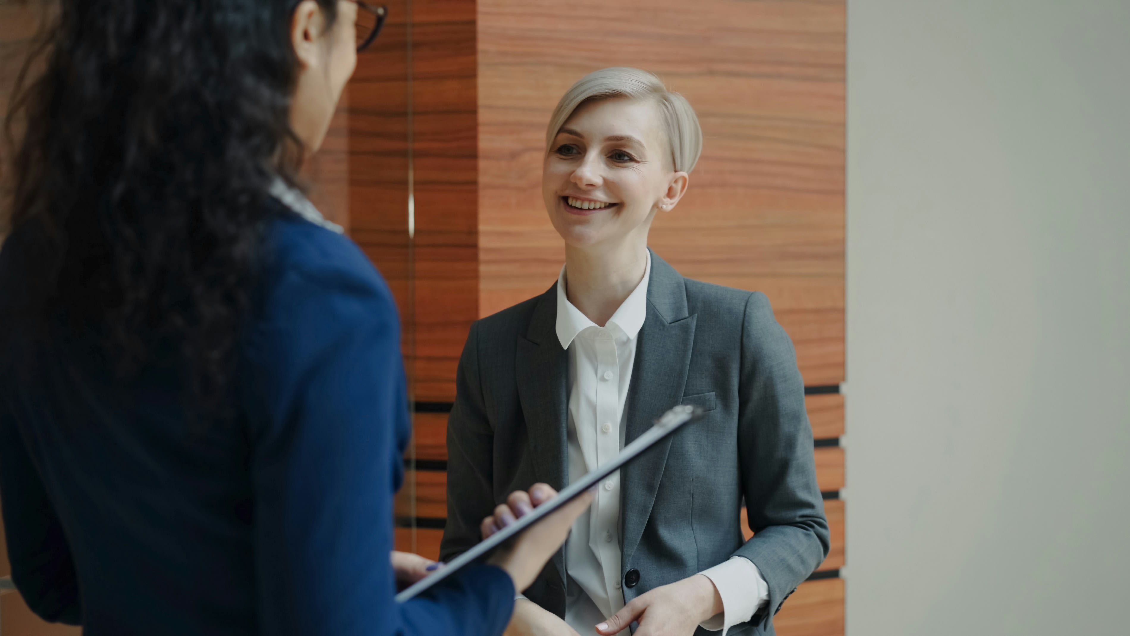 https://unsplash.com/photos/two-women-in-business-attire-talking-WFefT1a_gVE Photo by Vitaly Gariev on Unsplash