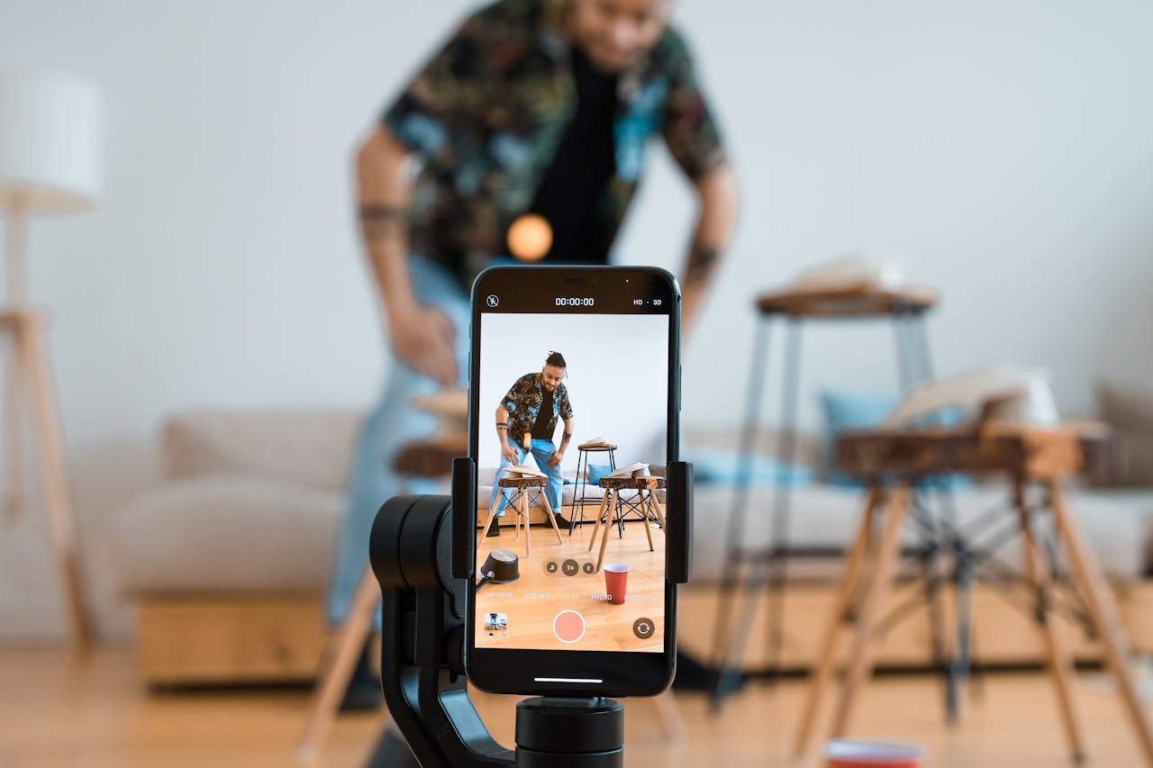 Photo by Ron Lach : https://www.pexels.com/photo/a-mobile-phone-on-a-tripod-8359967/