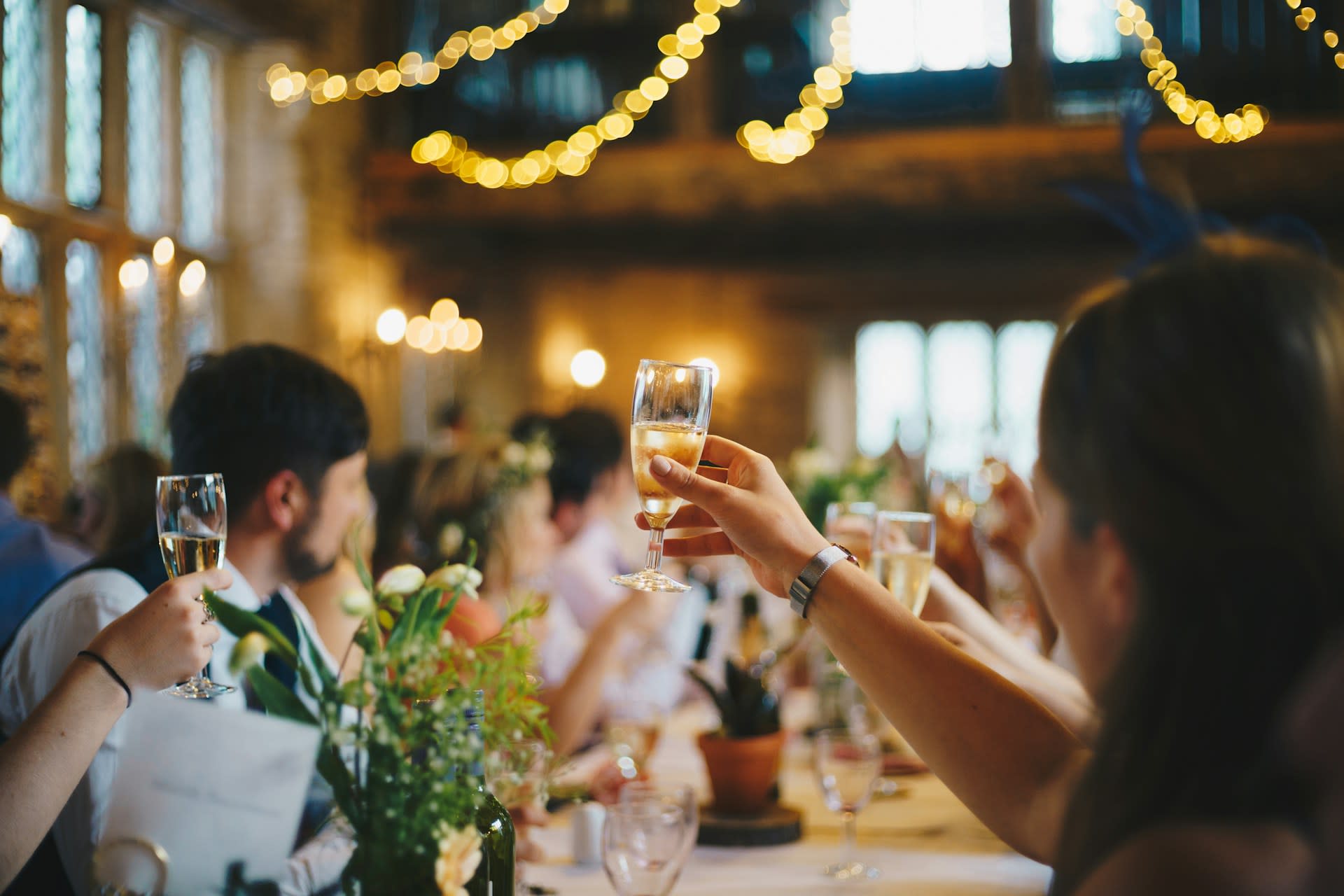 https://unsplash.com/photos/people-raising-wine-glass-in-selective-focus-photography-ULHxWq8reao