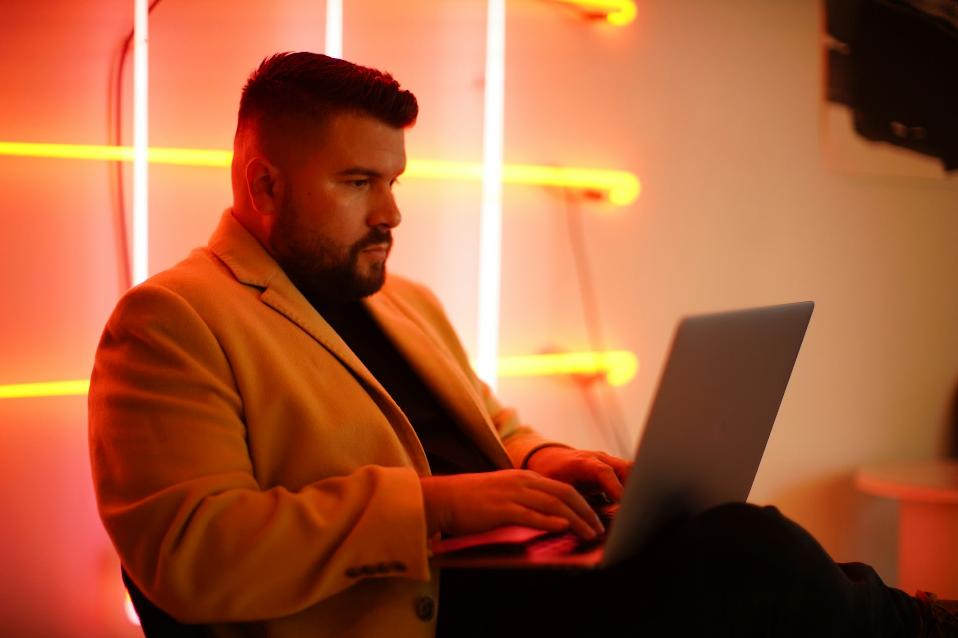 https://unsplash.com/photos/man-in-brown-suit-jacket-using-macbook-ZmGWjK0x3Ow Photo by Carlos Gil on Unsplash