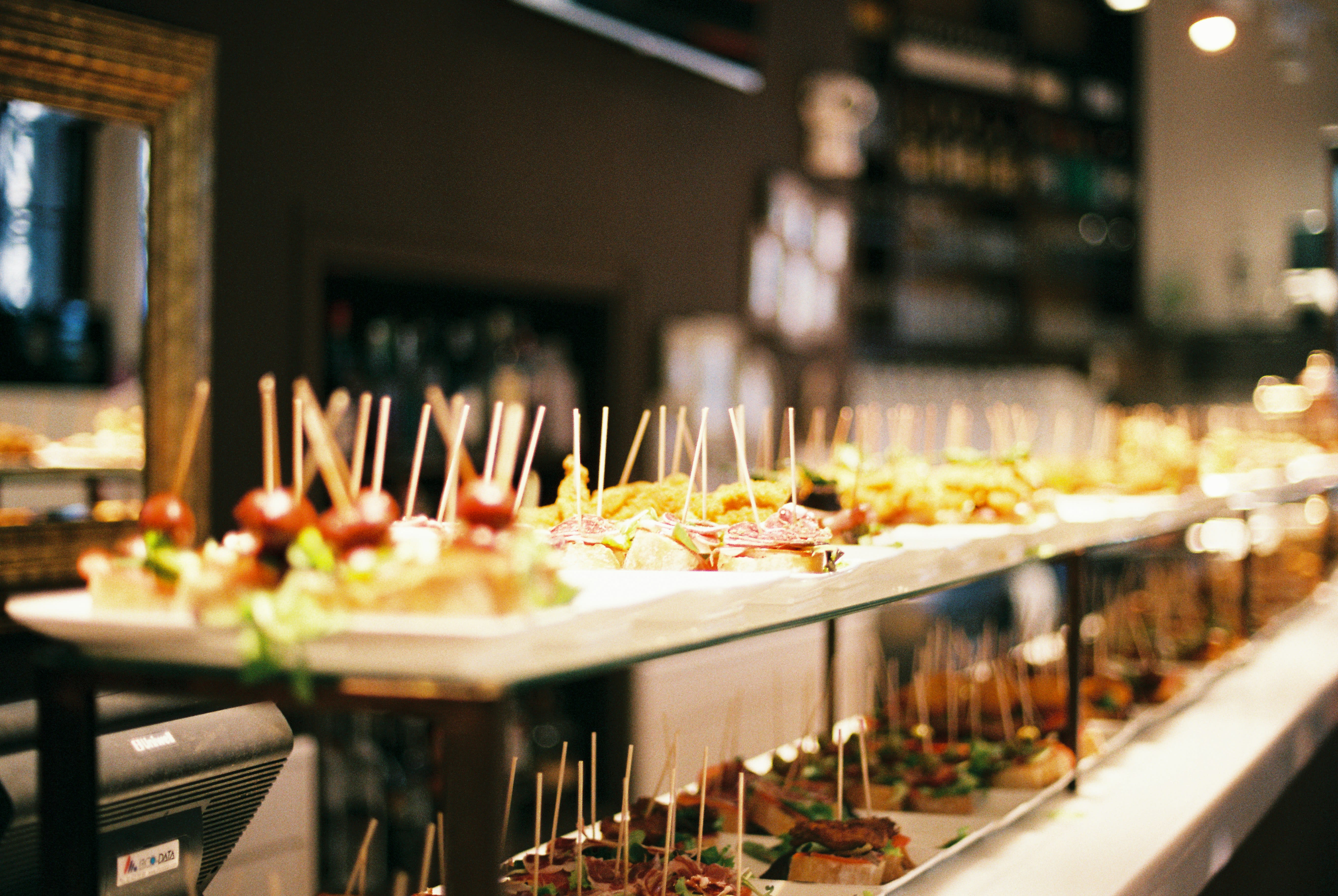https://unsplash.com/photos/a-buffet-line-with-a-variety-of-appetizers-eDu0pbME1tc