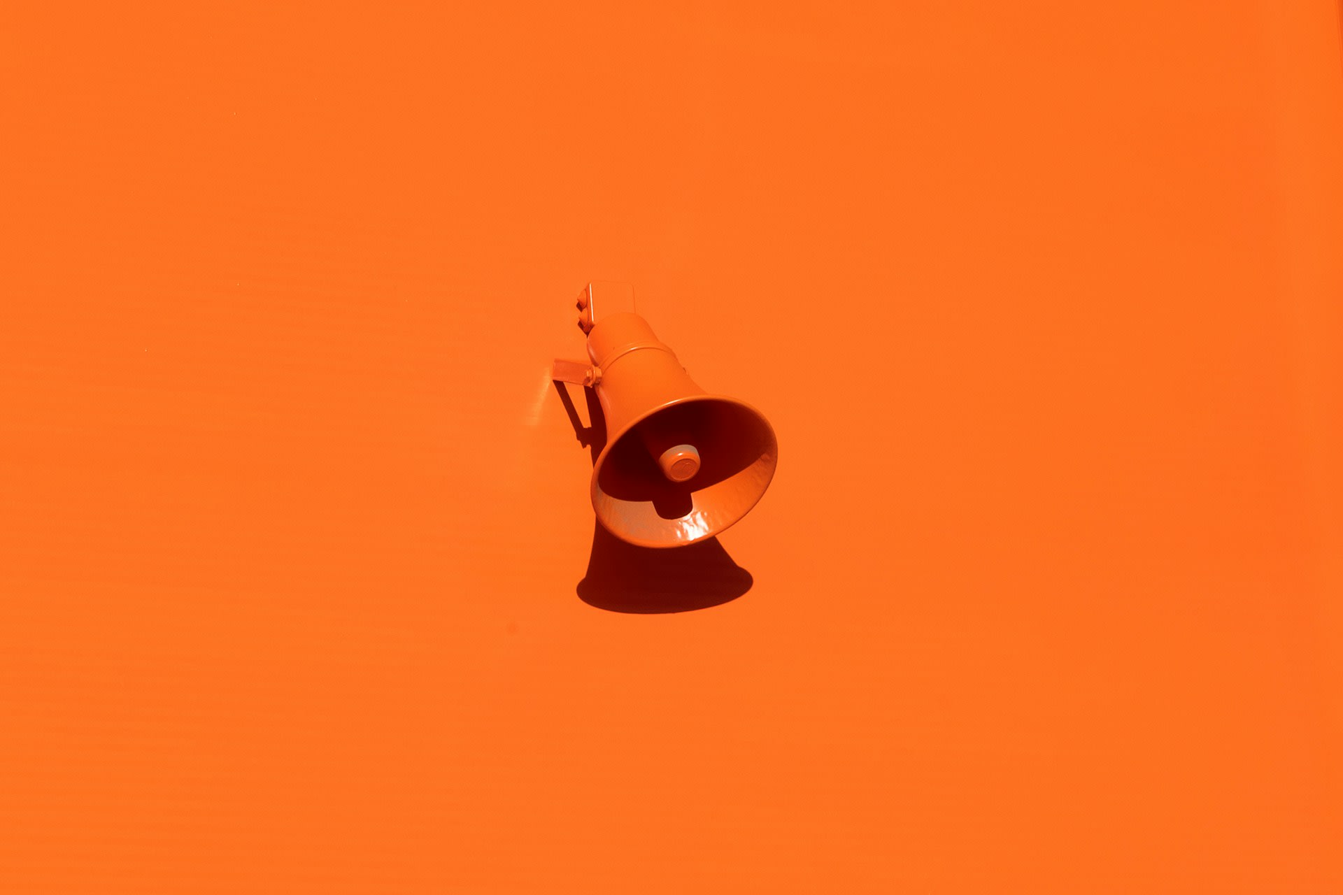 https://unsplash.com/photos/orange-megaphone-on-orange-wall-QRKJwE6yfJo