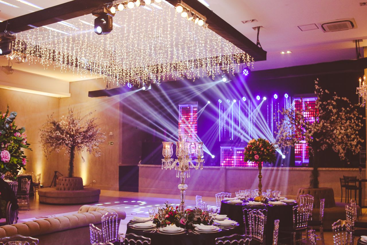 Photo by Vidal Balielo Jr.: https://www.pexels.com/photo/photo-of-an-empty-banquet-hall-prepared-for-a-party-14646749/  