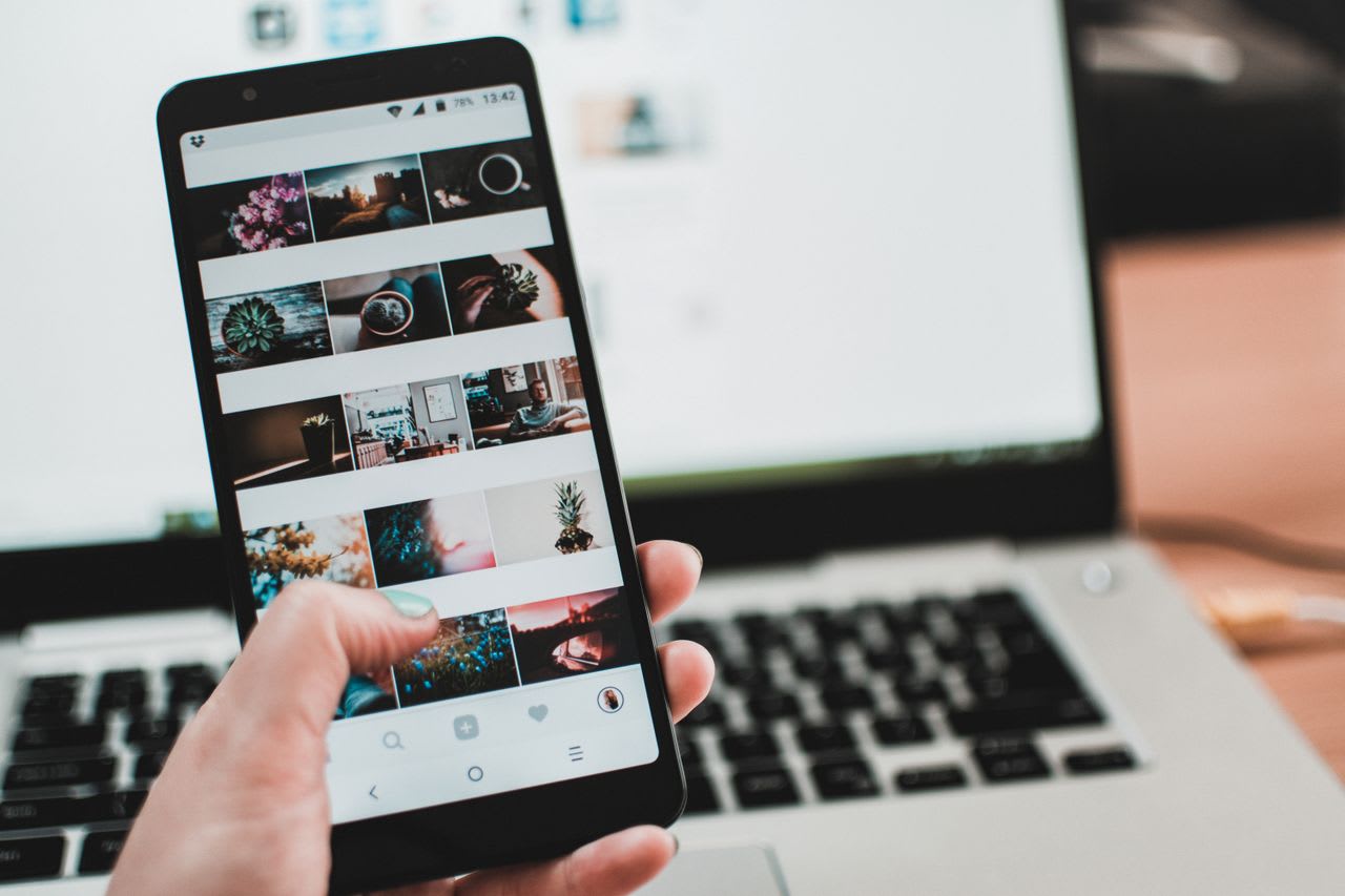 https://www.pexels.com/photo/person-holding-midnight-black-samsung-galaxy-s8-turn-on-near-macbook-pro-1092671/