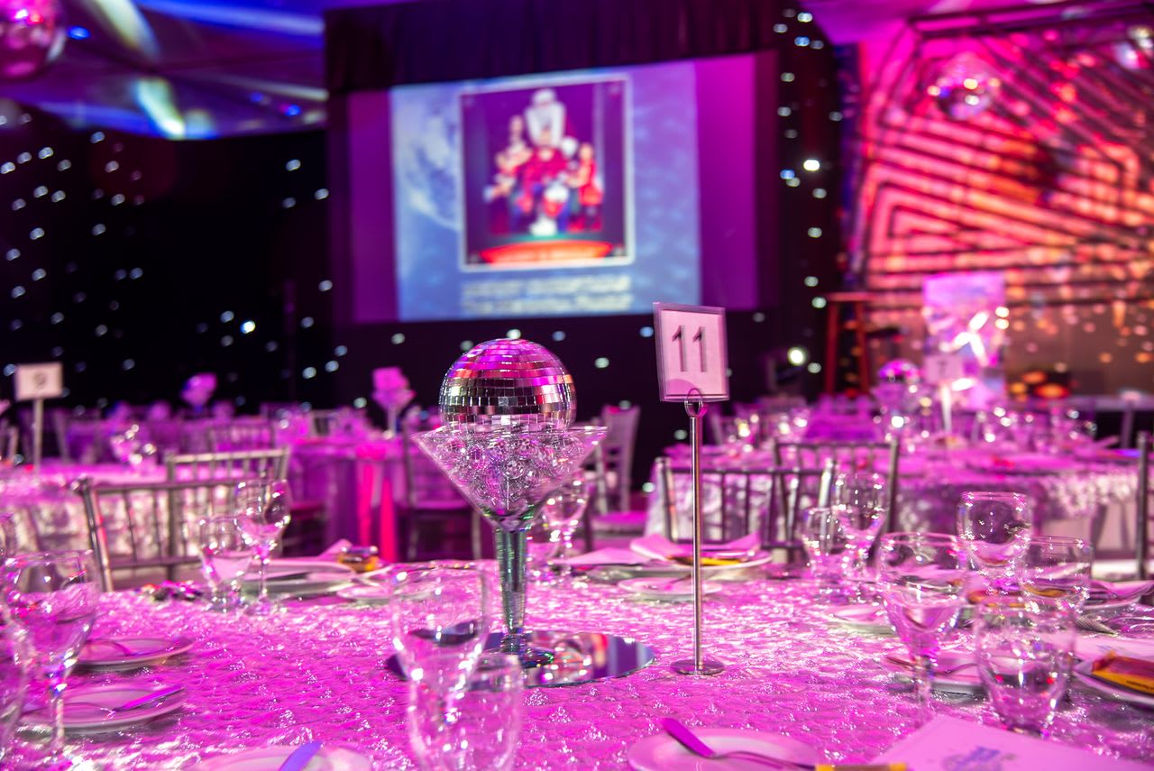 https://www.pexels.com/photo/elegant-themed-dinner-setting-with-disco-ball-35042467/