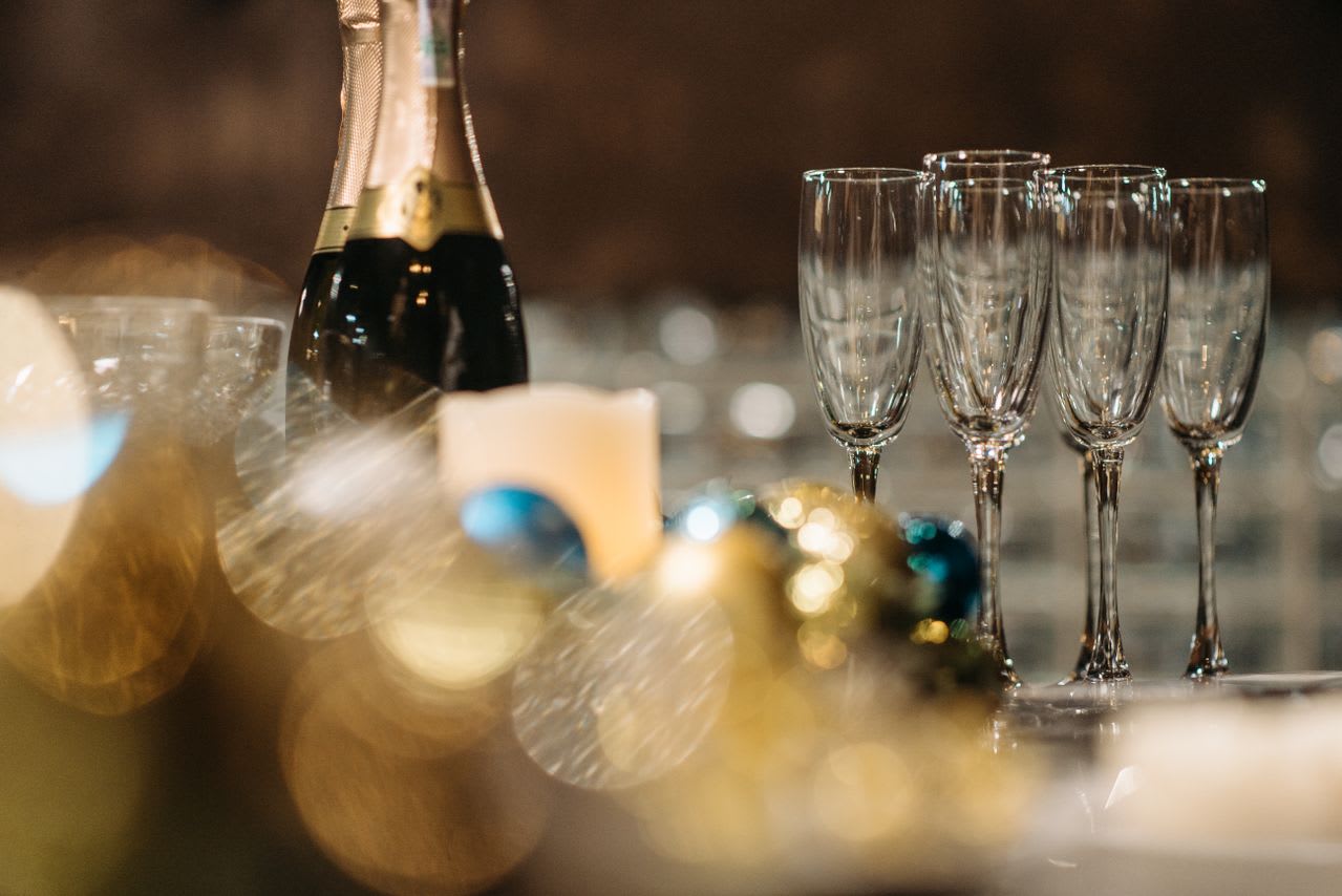 https://www.pexels.com/photo/close-up-photo-of-champagne-bottles-and-wine-glasses-6405650/