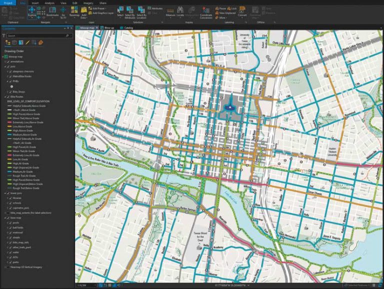 A screenshot of ArcGIS Pro that shows a zoomed-in map of urban Austin, Texas, with colourful intersecting lines running along key roadways to show bike routes.