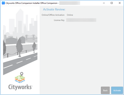 Screenshot of the Cityworks Office Companion Installer displaying an activation review page with Online activation selected, a license key field and Back and Activate buttons at the bottom beside a grayscale cityscape illustration.