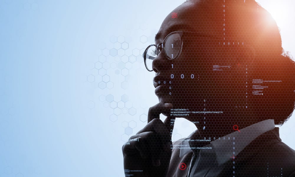 Against a sky-blue backdrop, a dark-skinned woman wearing glasses holds her chin thoughtfully. Light flares at the back of her head, and she is overlaid with technological symbols.
