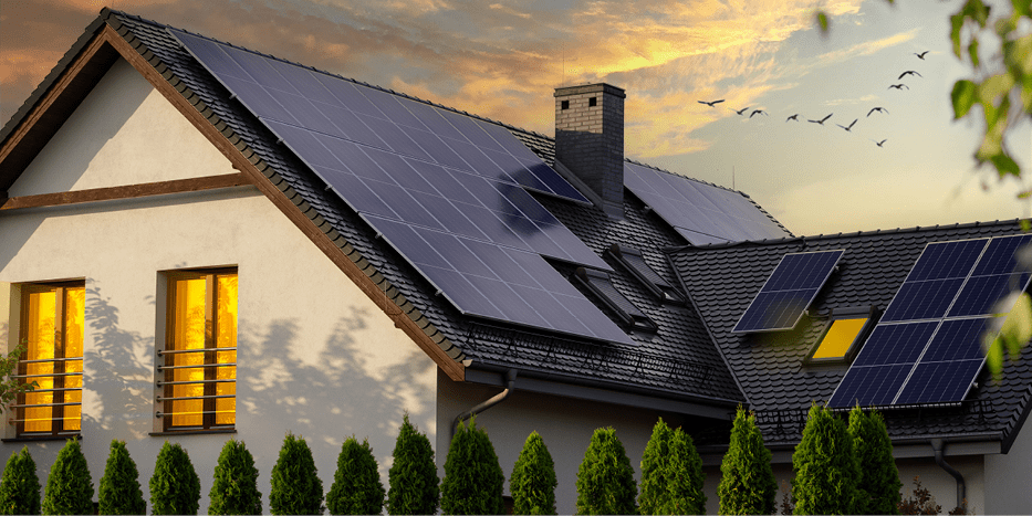 Roof of house with solar panels at dusk