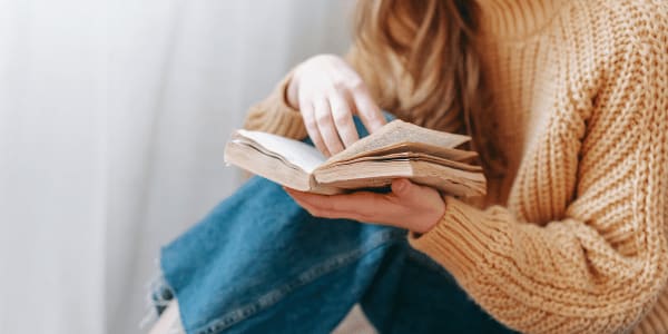young adult reading mystery book