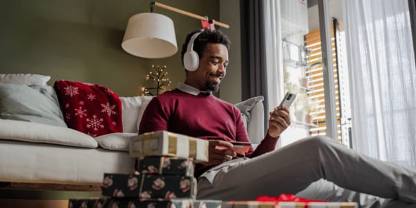 young man cyber monday shopping