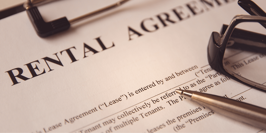 A rental agreement form on a clipboard