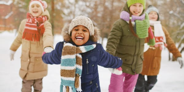 kids playing in snow on snow day