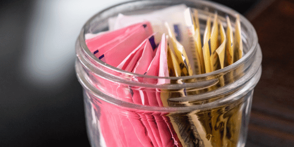 jar of artificial sweetener packets