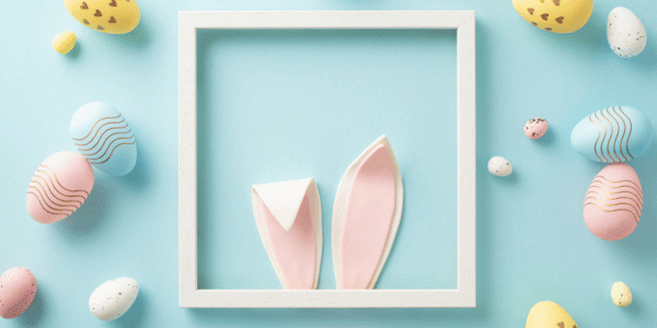 Easter Bunny ears in frame surrounded by Easter eggs