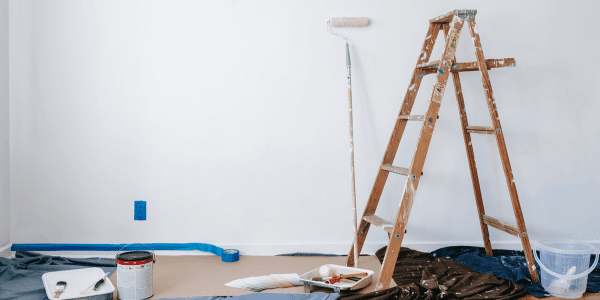 painting supplies in empty room