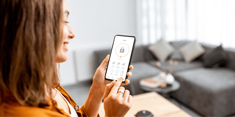 woman holding phone with lock on screen