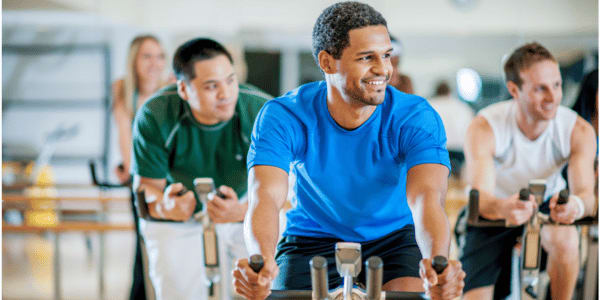 man doing spinning workout class