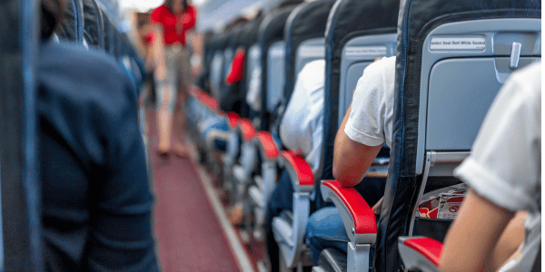 people using armrests on plane