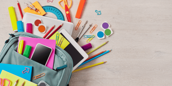 back to school supplies falling out of backpack