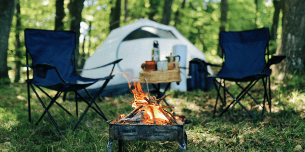 tents pitched at campsite in forest