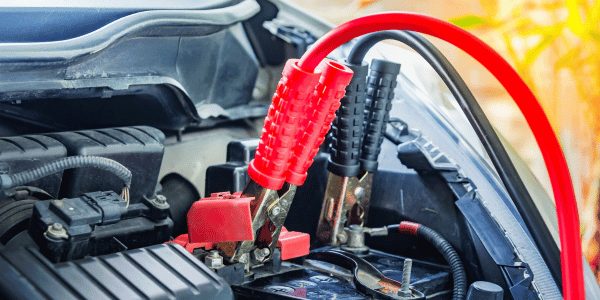 jumper cables from car essentials kit