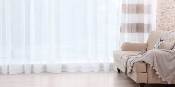 apartment windows with curtains