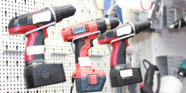 three red cordless drills