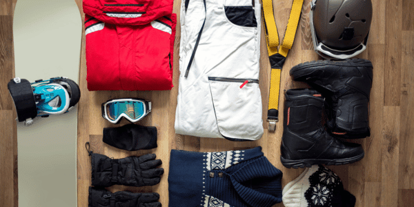 ski travel items on floor