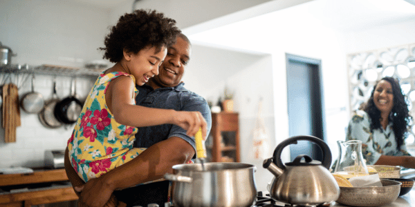 African American family cooking meal from Black chef
