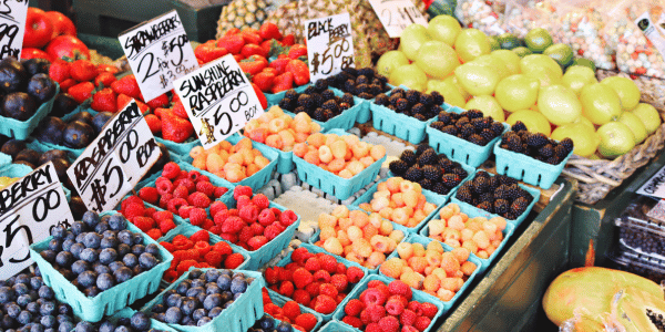 assorted berries and fruits at local farmers market