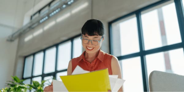 woman reviewing new HOA rules