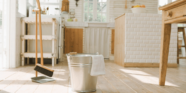 bucket and eco-friendly mop for spring cleaning in kitchen