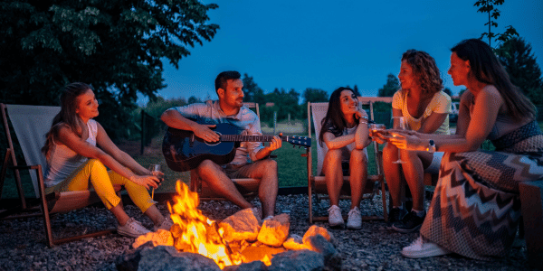 family having bonfire to celebrate the summer solstice