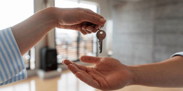 receiving keys for new home from an HOA vendor