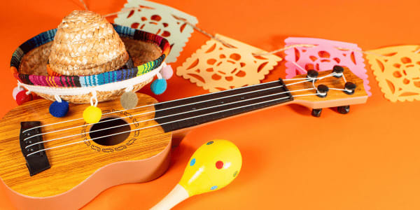 cinco de mayo hat, cut paper, and mariachi