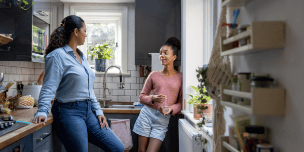 Happy mother and daughter bonding at home