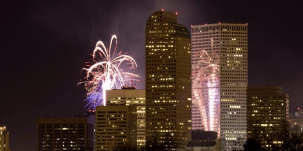 celebratory fireworks over downtown Denver skyline