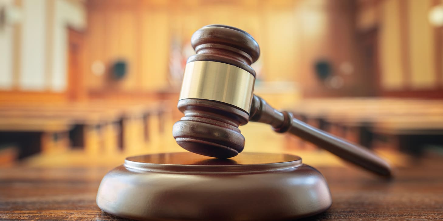 Judge's gavel in an empty courtroom 