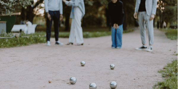 group of people playing bocce ball