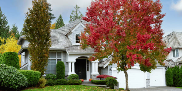 home exterior with autumn foliage
