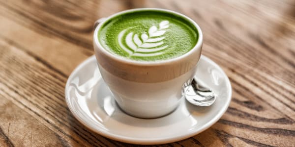 matcha latte in mug on table