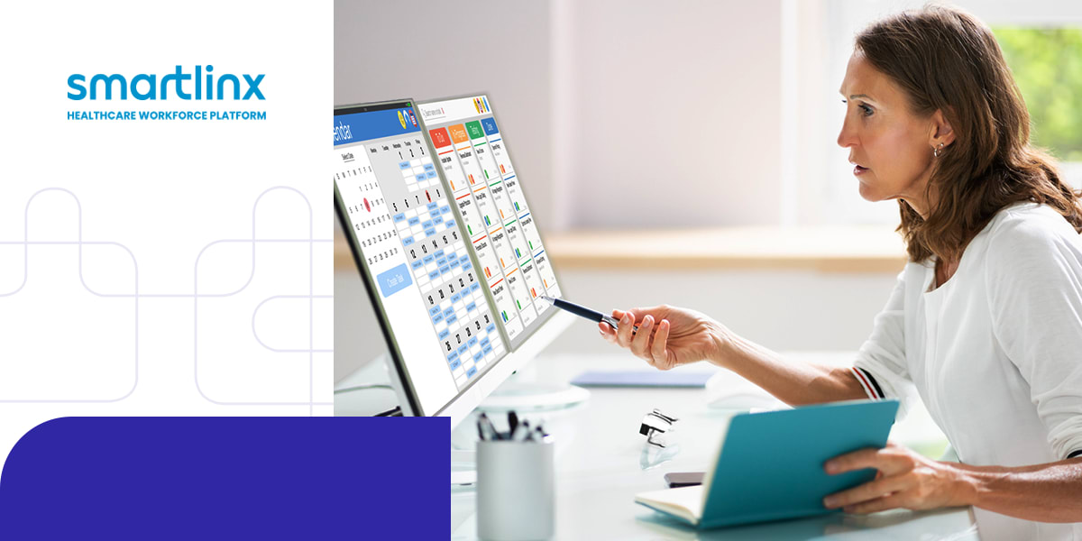 Woman looking at Smartlinx software on screen to manage healthcare workforce.