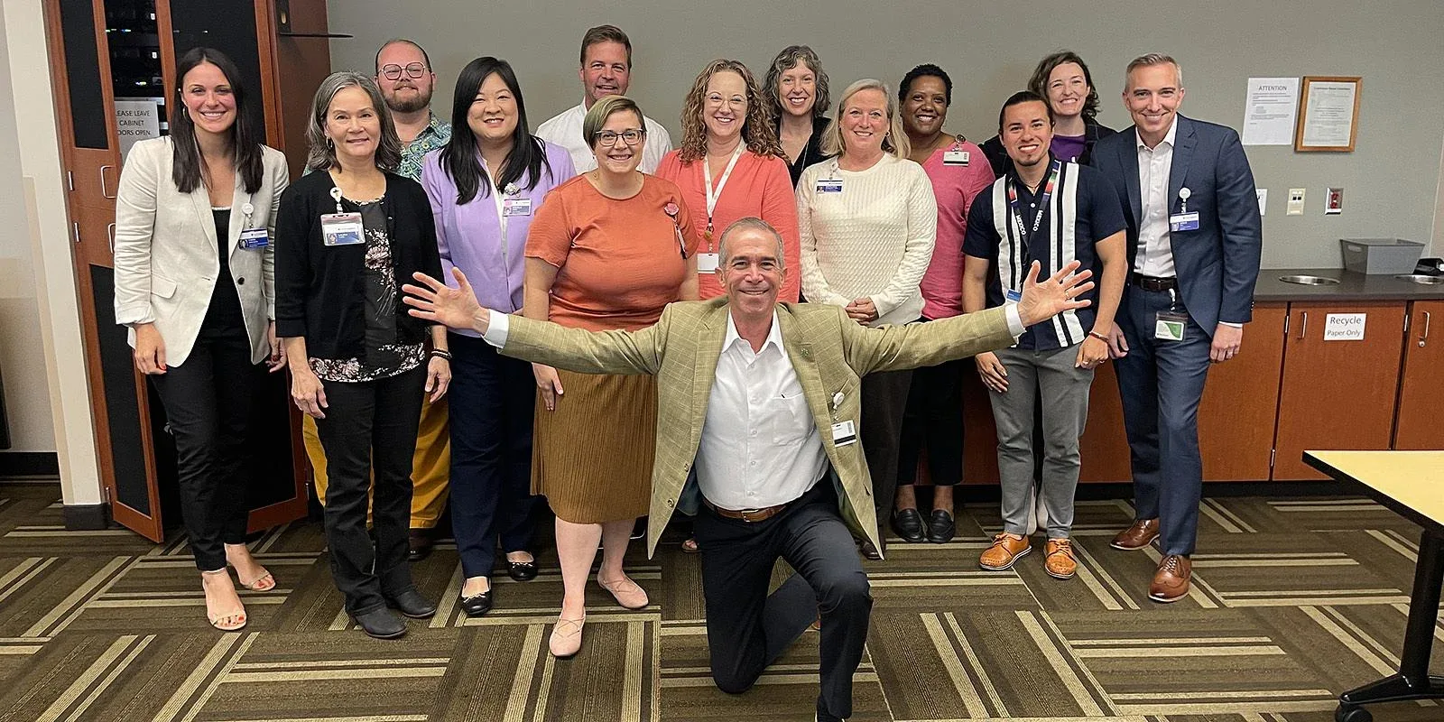 Above: Erik Wexler (front) with leaders of Providence Oregon’s caregiver resource groups.