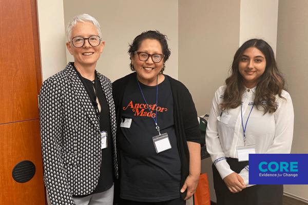 CORE's Lisa Angus, Apoorva Somayazulu, and keynote speaker Dr. Aileen Duldulao standing together at the Data Summit 