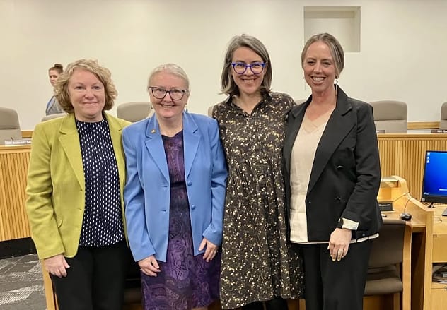 Four women from CORE and Providence stand together at the Oregon state capital after giving testimony on the links between food access and health