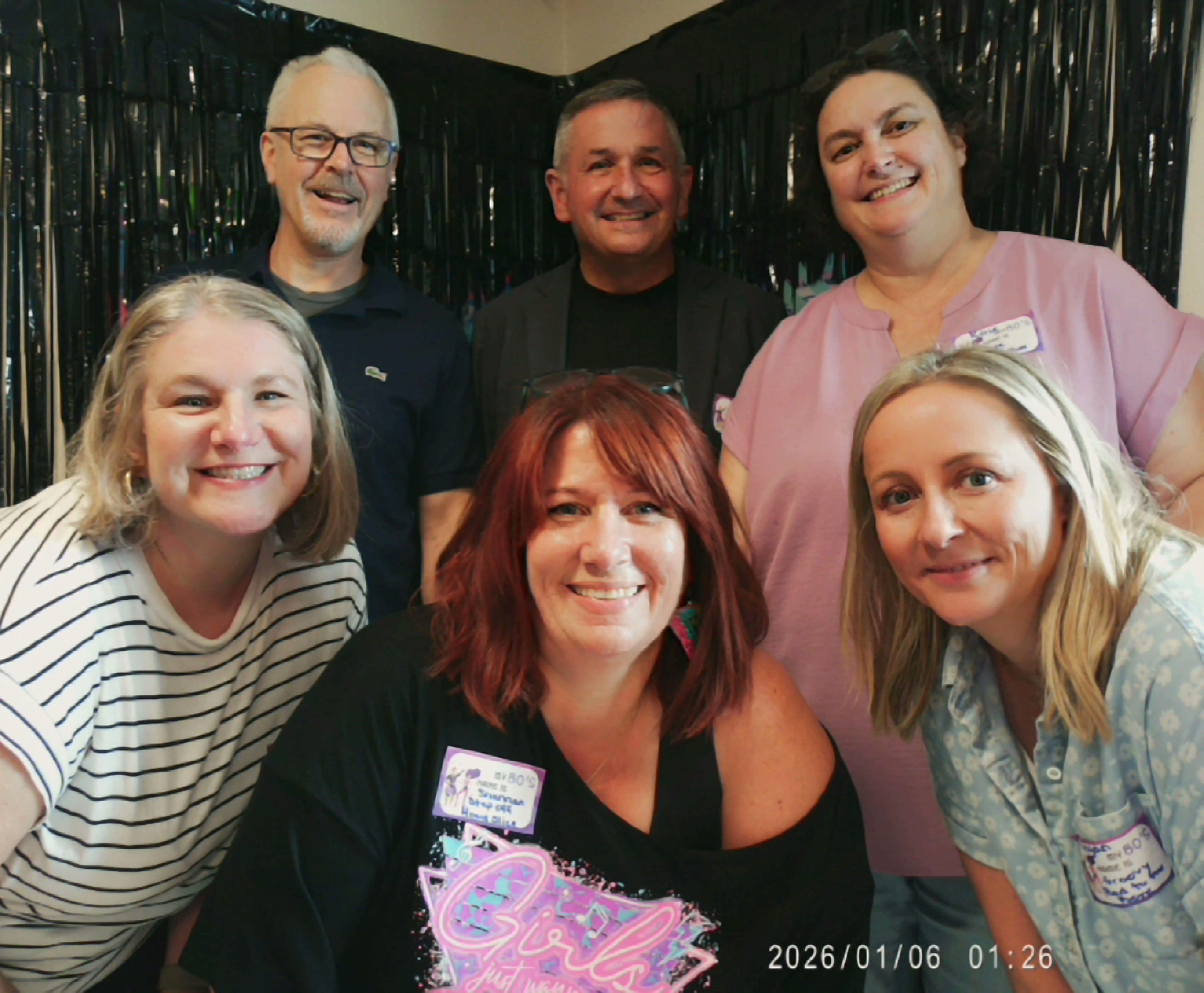 Members of the Oregon Providence Supportive Housing team celebrate: Bottom, left to right: Jessica Franklin, Senior Compliance Specialist; Shannan Stickler, Housing Program Manager; Megan DePinto, Business Manager; Top: John Donahue, Resident Service Coordinator; Tim Zaricznyj, Executive Director; Rose Browning, Business Manager.