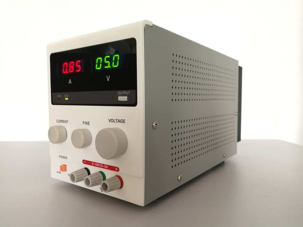 A power supply with variable output voltage.